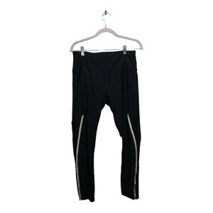 Black‎ Workout leggings by RBX w/reflective stripes Sz L Poly 92%  Spandex 8%